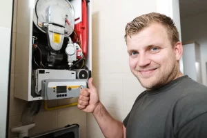 ProStar Plumbing crew doing furnace maintenance Calgary, AB