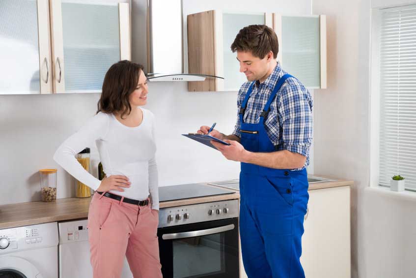 plumber and homeowner conversation